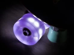 Chaya Neons LED Light Up Roller Skate Wheels Purple 65mm 78a - 4 Pack -Sports Scooter Shop chaya neons led light up roller skate wheels purple glow